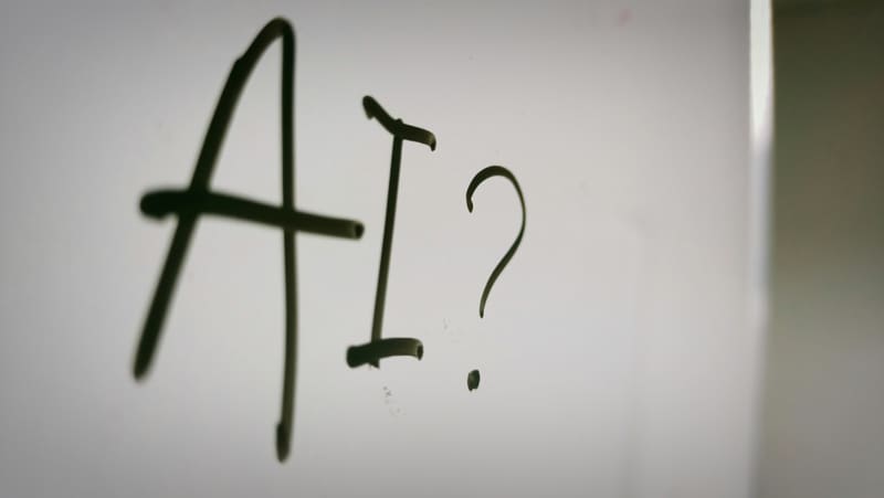 A balance scale with the political left and right symbols on either side, representing AI's contested political identity